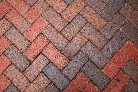 Paver Cleaning vs. Paver Sealing: What Each One Fixes (and When You Need Both)
